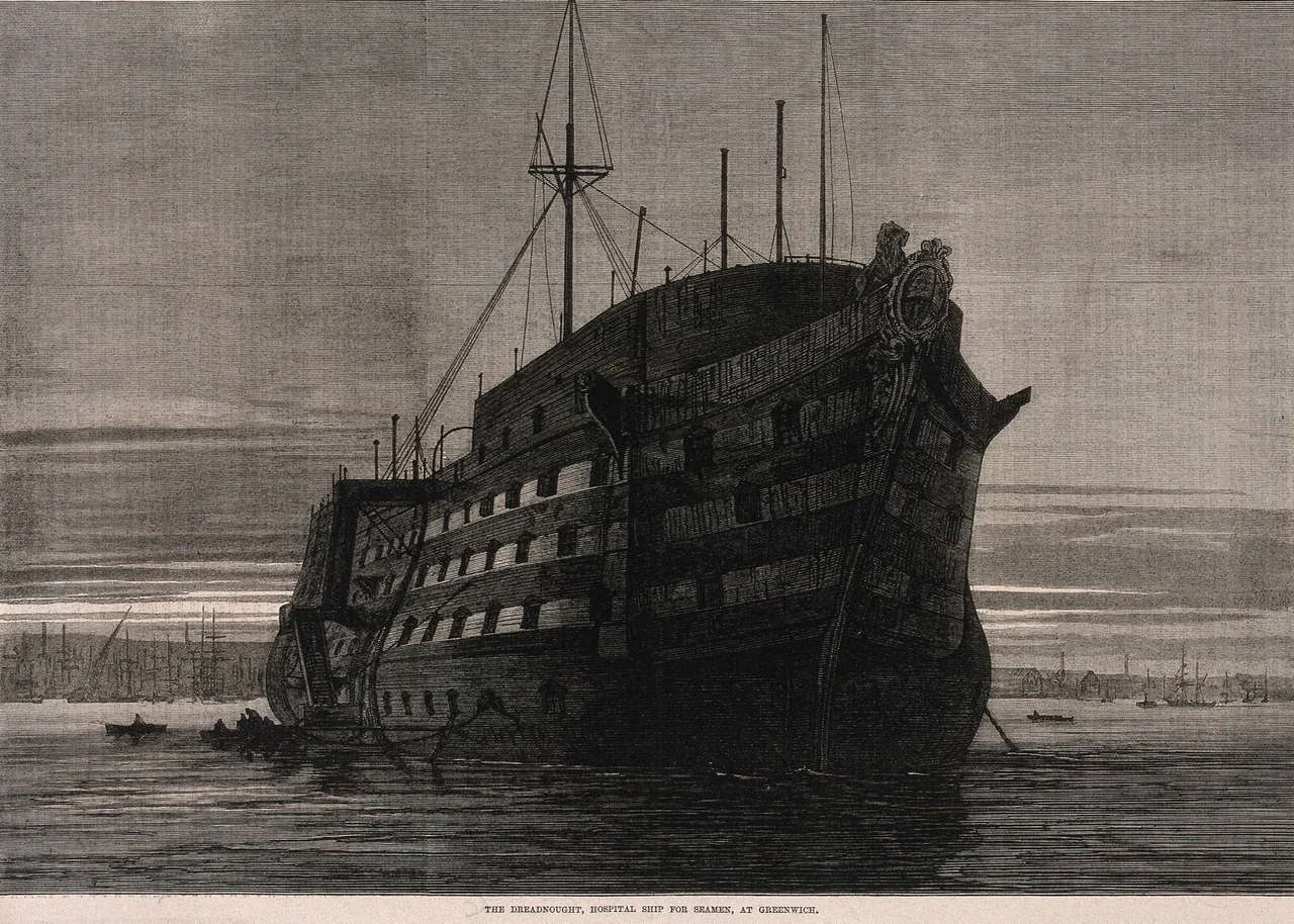 An 1870 engraving of the large Dreadnought hospital ship moored off Greenwich, with small rowing boats alongside.